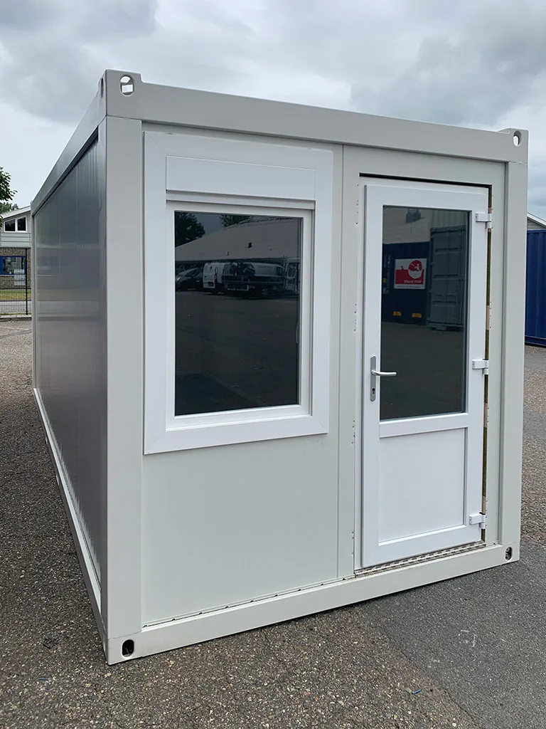 20ft flat pack office module corner with glazed PVC door and tilt-and-turn window